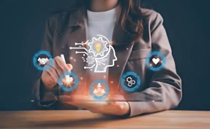 Person holding a tablet with digital icons representing skill-building